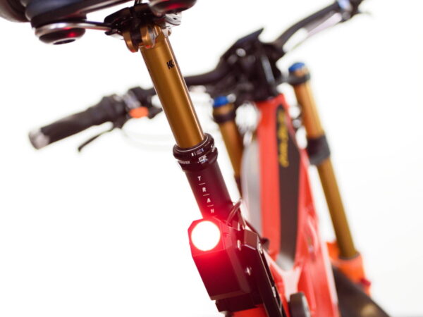Integrated rear tail light for nighttime visibility